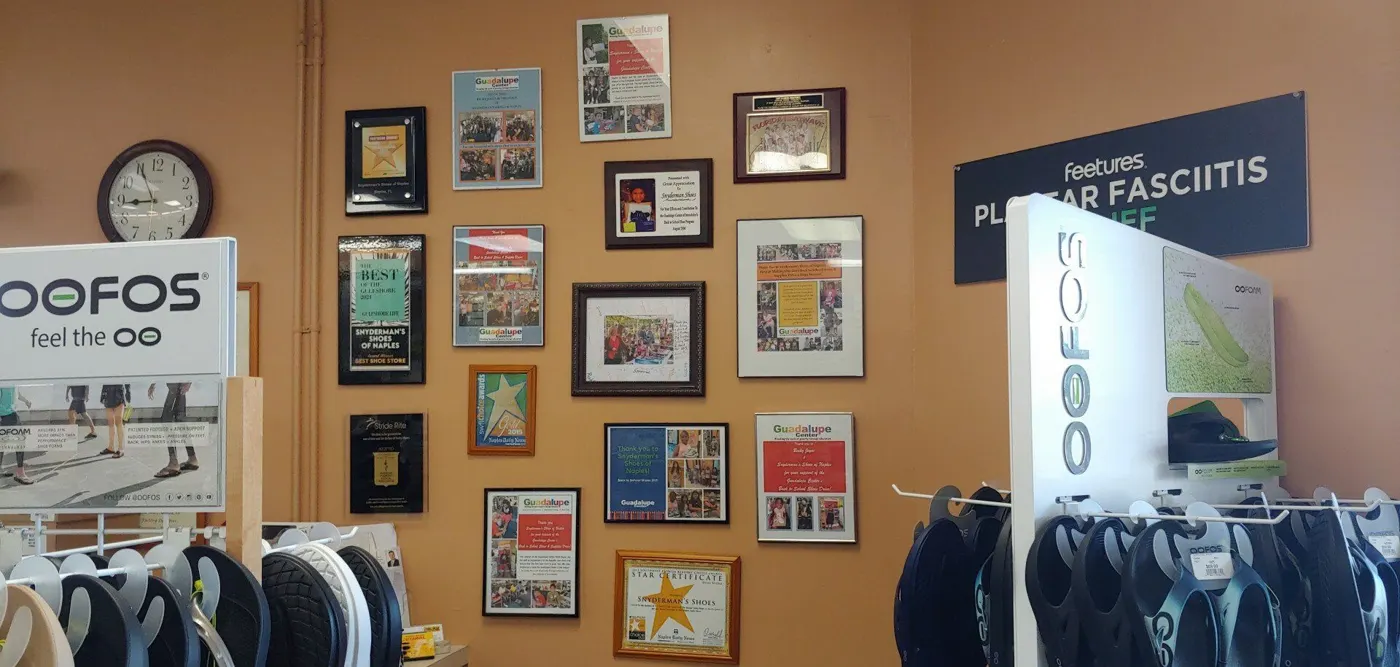 Community recognition plaques on the store wall